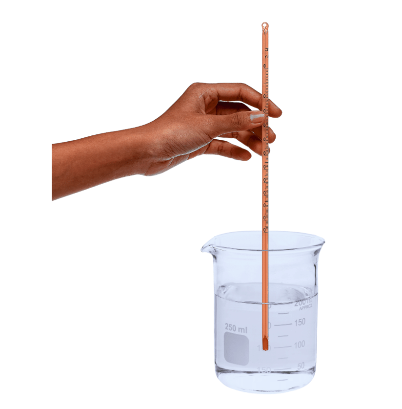 Hand holding laboratory thermometer dipped in water in the correct way.