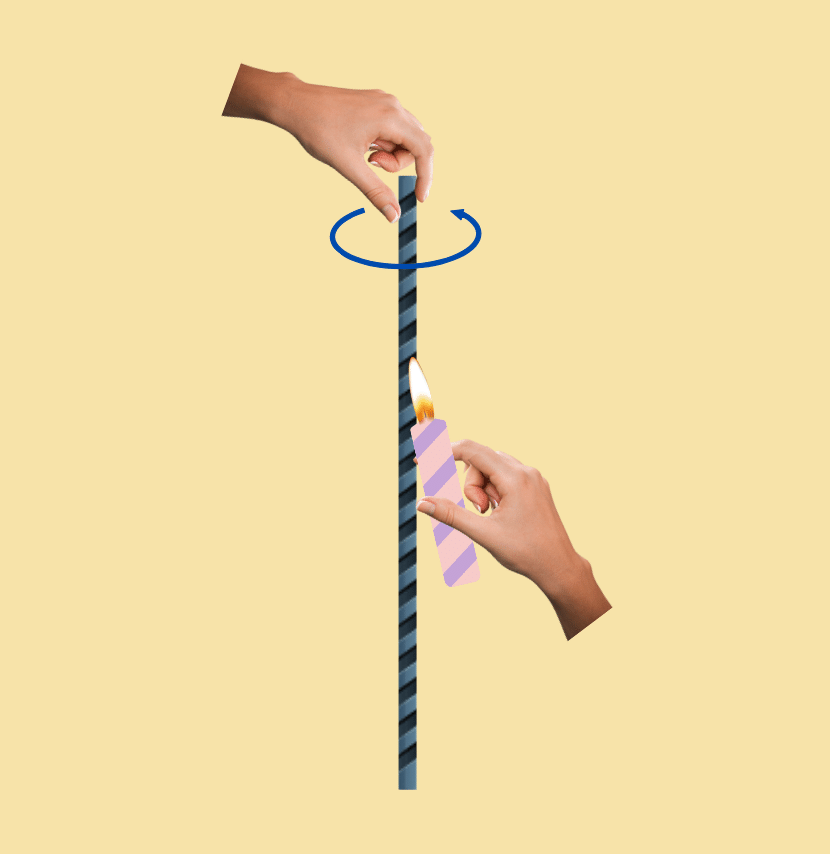 Rod wrapped with paper being rotated as a candle is held against it.