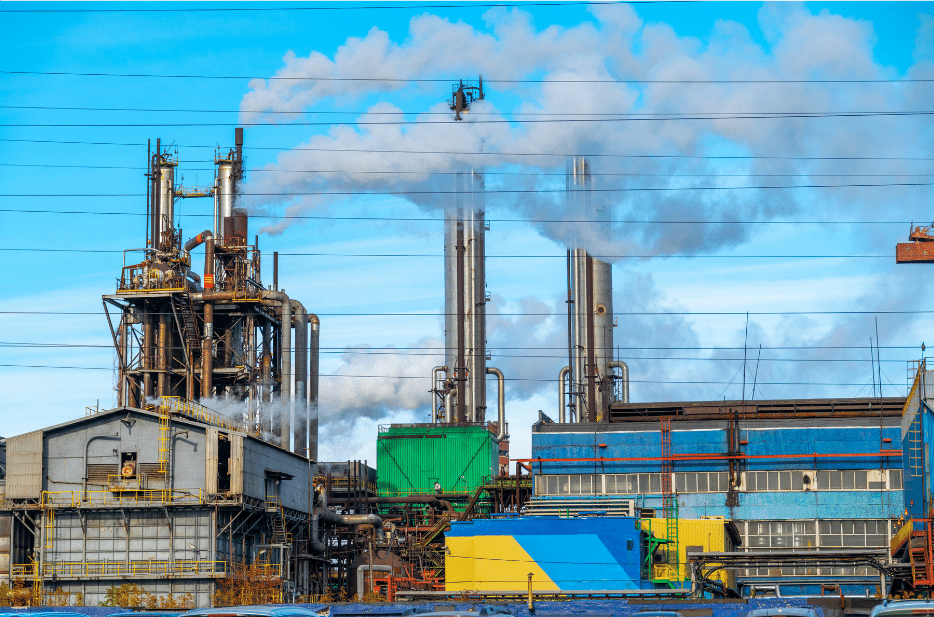 Industrial emissions from chimneys.