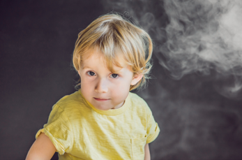 Child exposed to passive smoking.